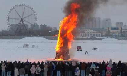 Maslenitsa holiday burning of an effigy on the border with China on the Amur River