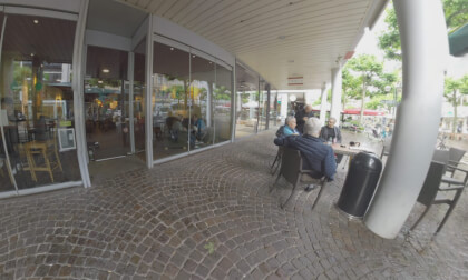 360 VR Pedestrian street with stores and cafes on rainy day. Frankfurt, Germany