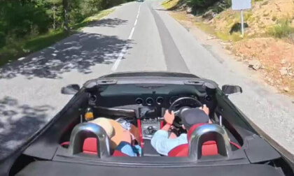 French Mountain Driving Through Rock Arch