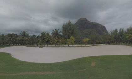 360 VR Scene of green empty golf course with palms around, Mauritius
