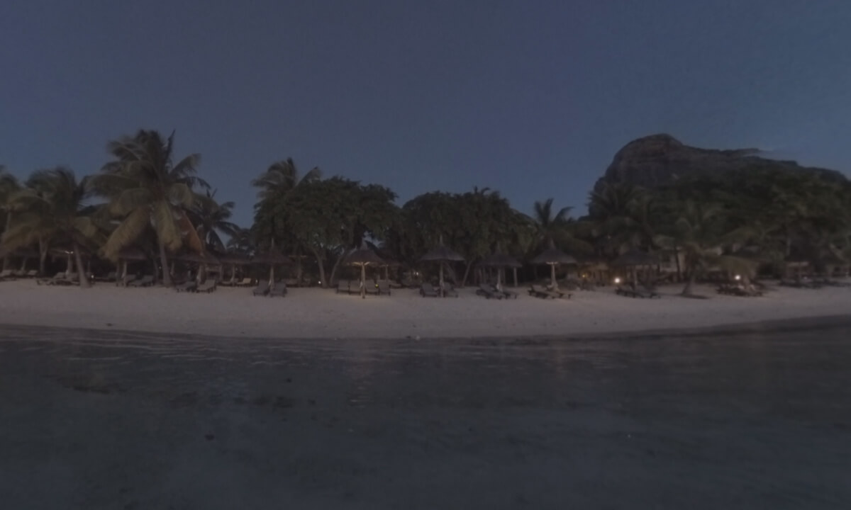 360 VR Resort on ocean coast and family bathing in the dusk, Mauritius