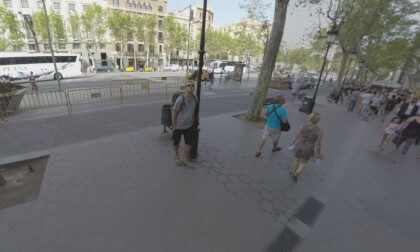 360 VR View of Barcelona street with people, transport and bike lane