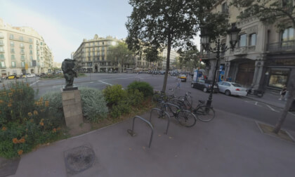 360 VR Traffic circle and pedestrians in the street of Barcelona, Spain