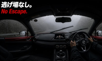 No Escape. Driving a Roadster through Heavy Rain and Thick Fog.