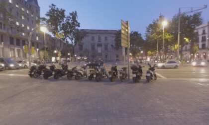 360 VR Barcelona view with pedestrian street and road traffic in the dusk, Spain