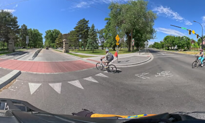Careless Driver Makes Illegal U-Turn, Frightening Bike Rider