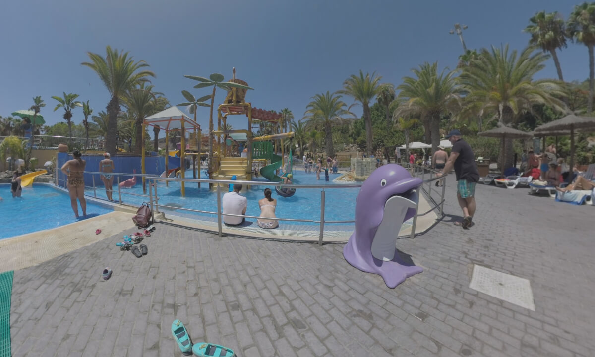 360 VR Adults relaxing and children having fun on water attractions of resort, Gran Canaria