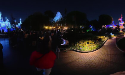 15.3 Walking past front right of Disneyland's Magic Castle at nigght with Clare and Patrick