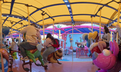 26. Disneyland's Jessie's Critter Carousel (Doug, Molly, Clare and Patrick in a row)