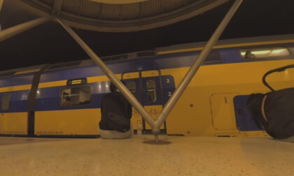 360 VR Subway station with people and arriving double-decker train, Rotterdam