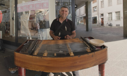 Street musician in Freiburg, Germany Street musician in Freiburg, Germany