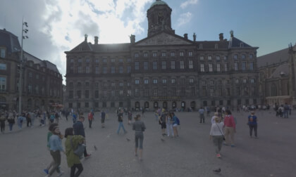 360 VR View to Dam Square with people in Amsterdam, Netherlands