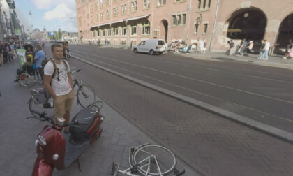 360 VR Damrak street with view to Beurs van Berlage in Amsterdam