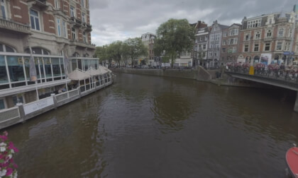 360 VR View of Amsterdam with canal, Dutch architecture and Munttoren