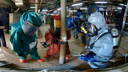 Firefighters sealing leaking pipe of corrosive toxic hazardous material 360VR