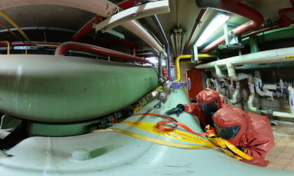 Firefighters sealing leaking container of corrosive toxic hazardous material 360VR