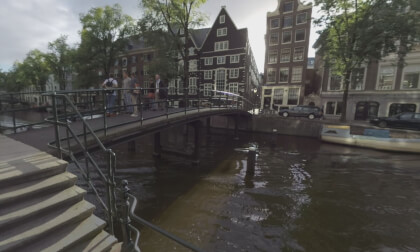 360 VR Amsterdam street with footbridge over the canal, Netherlands
