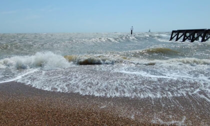 Landguard Felixstowe, waves breaking on the shore