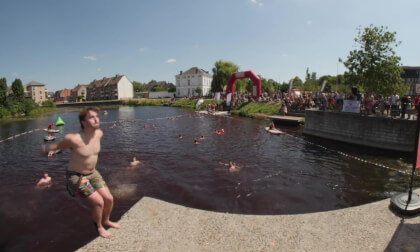 BigJump - People jumping in a river clean water