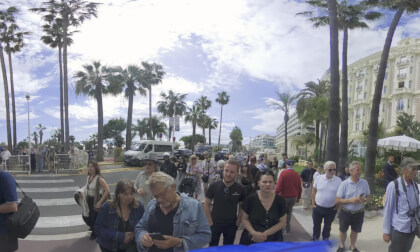Who's she and that weird paparazzi? Cannes Festival front of Carlton hostel