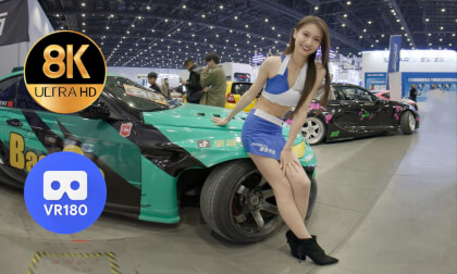 Racing Girl Beside Baoge’s Race Car