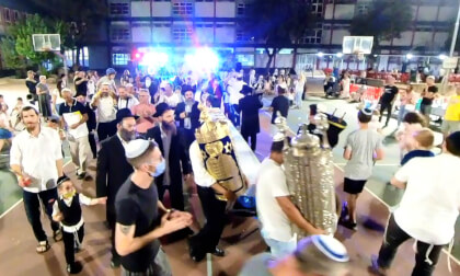 Breaking news: Men women and children dancing with Bible scrolls during the ceremony of Hakafot 360VR