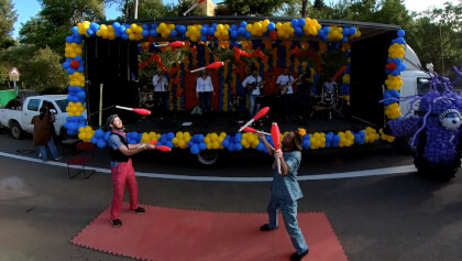 Breaking news: Independence Day street party for the children of Tivon, Israel, with balloons, jugglers, magician and a musical band, public place, unticketed, editorial. 360VR video vr panorama