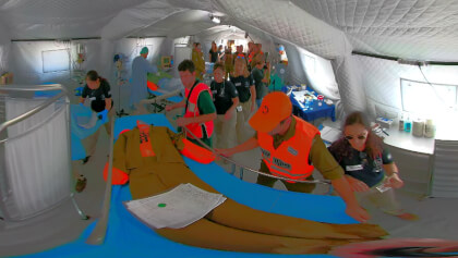 Injured people brought into field hospital. Paramedics doctors and medical staff give first aid to victims of earthquake terror biohazard attack fire tsunami war drill, Sheba Medical Center, Tel Hashomer Israel 360VR. Injured people brought into field hospital. Paramedics doctors and medical staff give first aid to victims of earthquake terror biohazard attack fire tsunami war drill, Sheba Medical Center, Tel Hashomer Israel 360VR.