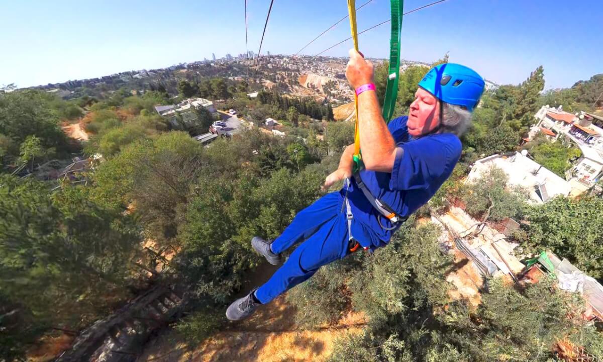 Extreme adrenaline! Flying the 730m Mega Omega Zipline over Jerusalem with epic views of the Old City, Peace Forest & Judean Desert. Unforgettable aerial adventure!