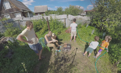 360 VR Family with children resting in the yard of country house 360 VR Family with children resting in the yard of country house