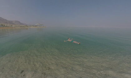 360 VR Dead Sea resort and man bathing in salt water