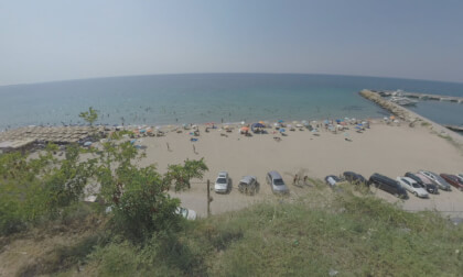 360 VR Hotels on waterfront and people at the beach in Nea Kallikratia, Greece