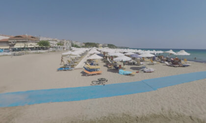 360 VR Coast with relaxing tourists in resort town Nea Kallikratia, Greece