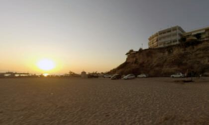 360 VR Resort town at sunset. Hotels, harbour and people on the beach, Greece 360 VR Resort town at sunset. Hotels, harbour and people on the beach, Greece