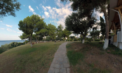 360 VR Green garden with restaurant near sea at Trikorfo Beach resort, Greece