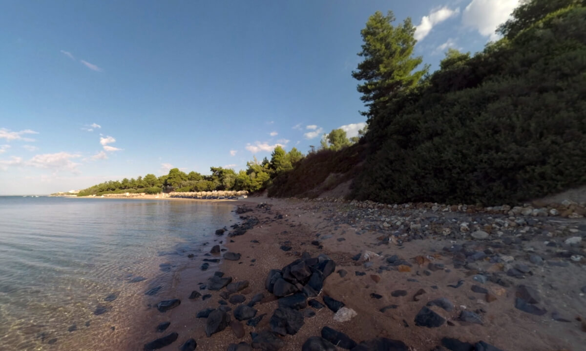 360 VR Landscape with rocky hills, sea and resort area in the distance, Greece