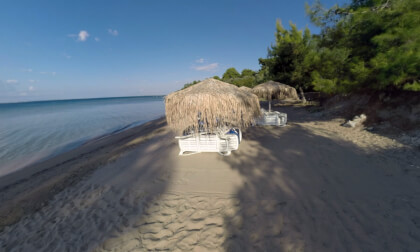 360 VR Sea and beach with sunbathing area at Trikorfo Beach, Greece 360 VR Sea and beach with sunbathing area at Trikorfo Beach, Greece