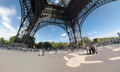 360 VR Timelapse of Paris life. People walking under the Eiffel Tower, France.