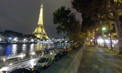 360 VR Paris at night. Scene with Seine, Eiffel Tower and busy street