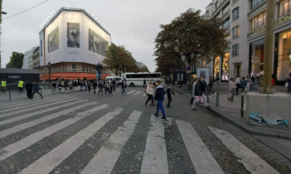 360 VR Paris cityscape with stores and people walking on Av. des Champs-Elysees