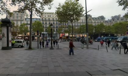 360 VR Cityscape of Paris with people walking on Av. des Champs-Elysees, France