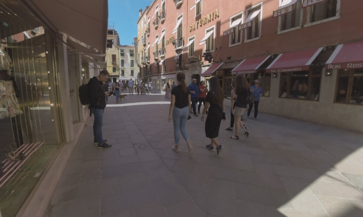 360 VR People walking in the street with houses and stores. Venice, Italy