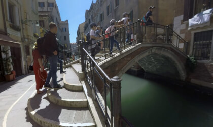 360 VR Tourists in Venice street. View with footbridge, canal and old houses VR Video 360 VR Tourists in Venice street. View with footbridge, canal and old houses VR