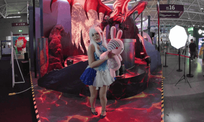 Girl holding a rabbit doll at the online game AION booth VR Video Girl holding a rabbit doll at the online game AION booth VR