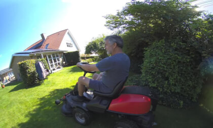 my son riding a gardening tractor at his grand parents on vacation VR Video my son riding a gardening tractor at his grand parents on vacation VR