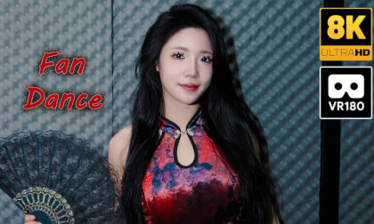 Chinese girl wearing cheongsam performs fan dance VR Video Chinese girl wearing cheongsam performs fan dance VR