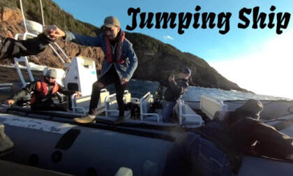 Zodiacs on the ocean, jumping from boat to boat Zodiacs on the ocean, jumping from boat to boat