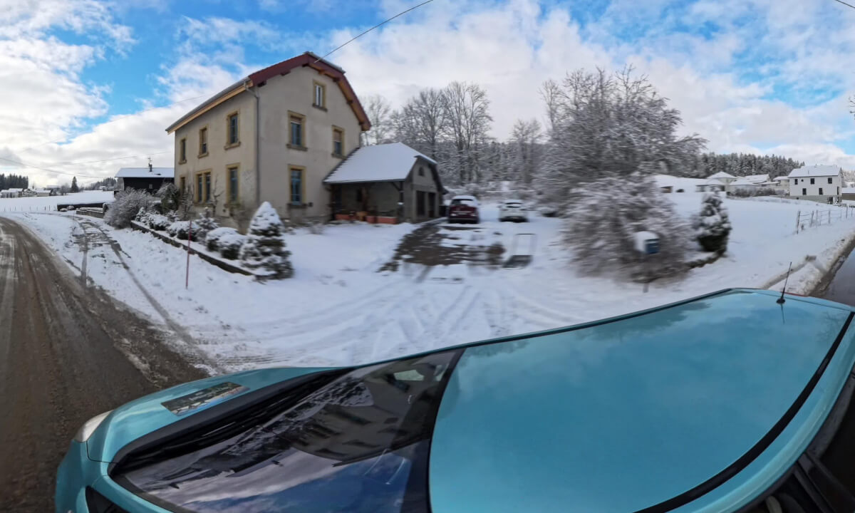 On the road In the completely snow-covered French Jura in 8k along the Doubs river