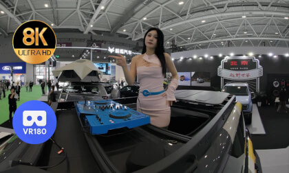 DJ girl at the booth of BAIC Motor DJ girl at the booth of BAIC Motor