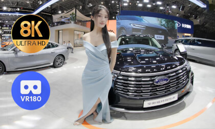 Models at the booth of Ford